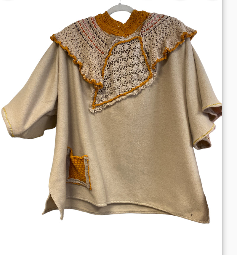 Camel fleece cape with crochet accents
