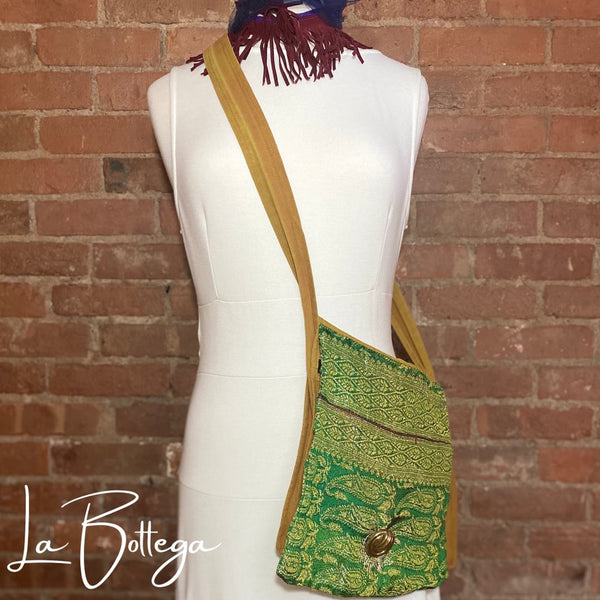 Green and tan patterned shoulder bag